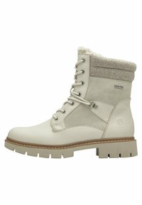 Bottines à lacets en cuir beige clair avec un col en feutre doux, une semelle en caoutchouc robuste et une marque DUO-TEX sur le côté.