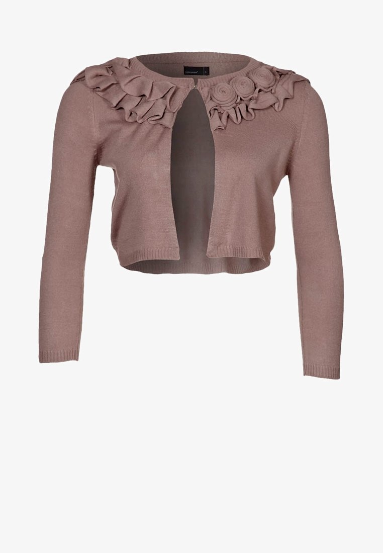 Cardigan court mauve avec manches longues, devant ouvert, col à volants et rosettes décoratives en tissu sur une épaule.