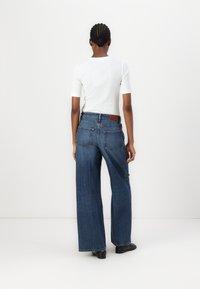 Tommy Hilfiger WIDE LEG  - Wide Leg - blue denim