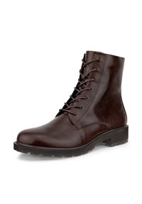 Bottine marron foncé en cuir à lacets, talon bas et semelle en caoutchouc robuste, vue en angle sur fond blanc.