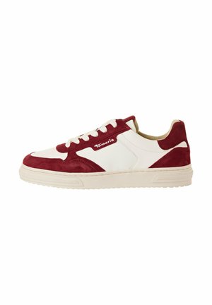 Red and white sneaker featuring a suede upper, lace closure, padded collar, and a textured rubber sole. Logo displayed on the side.