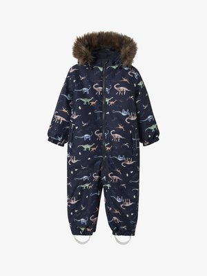 Tamsiai mėlynas vandeniui atsparus snowsuit'as, puikuojantis įvairių spalvų dinozaurų raštu, su dirbtiniu šaliku aptrauktu gobtuvu ir elastiniais rankovių bei kulkšnies aptempimais.