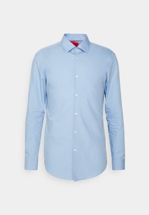 Light blue long-sleeve shirt made from cotton. Features a button-down collar and front placket with white buttons. Smooth texture, slim fit.