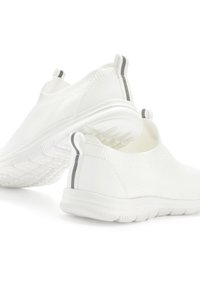 White slip-on sneakers with a textured knit upper, rubber sole, and gray accents on the heel tab. Features a minimalist design.