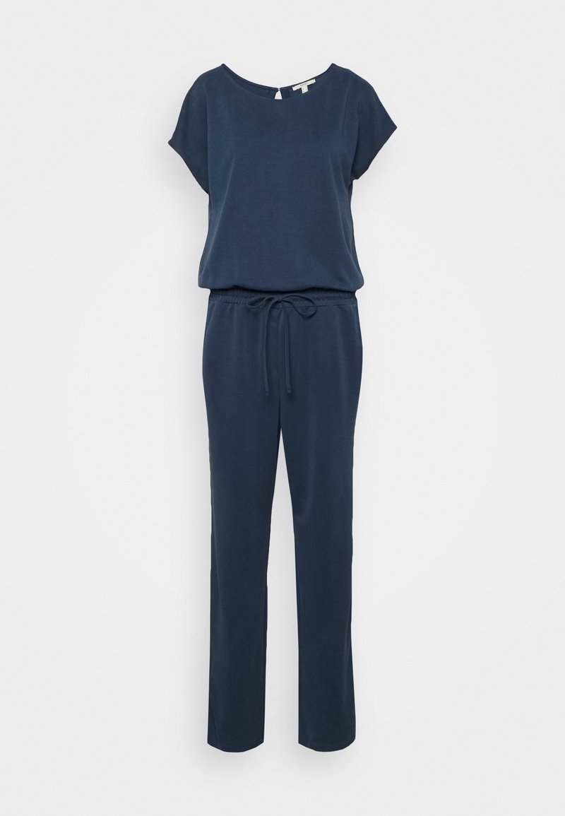 Combinaison à manches courtes bleu marine avec encolure ronde, taille élastique, lien à l'avant et pantalon à jambes droites sur fond blanc.