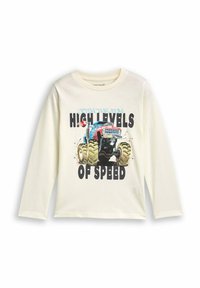 T-shirt a maniche lunghe color crema con una grafica di un camion mostro blu e rosso, dotato di pneumatici verdi sovradimensionati e testo in grassetto nero: "ALTI LIVELLI DI VELOCITÀ."