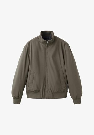 Olive green bomber jacket with a high collar, zip front, two side pockets, ribbed cuffs, and a smooth, matte fabric texture.