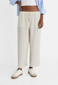 Stradivarius Tygbyxor - mottled beige