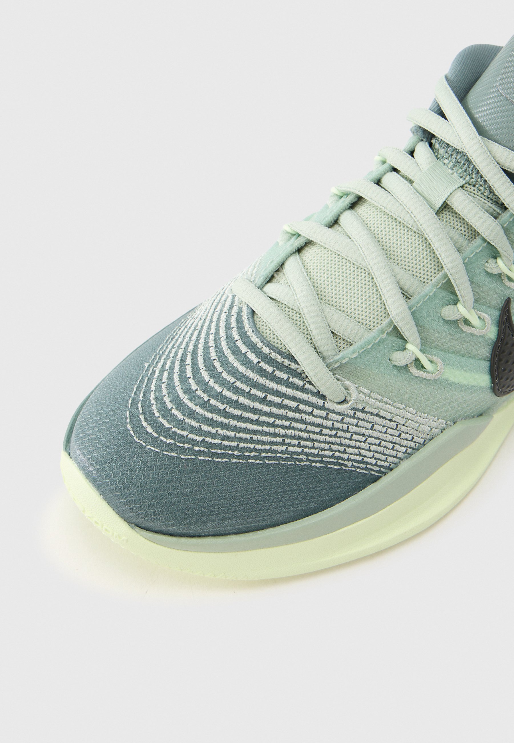 mint green and grey nike shoes