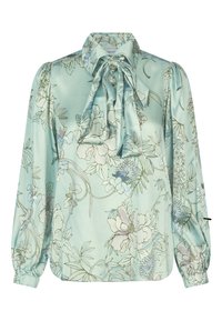 Blusa floreale in satin aqua chiaro, con colletto annodato, maniche a palloncino e polsini elasticizzati. Decorata con motivi floreali pastello e foglie.