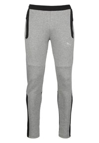Grijze sweatpants met een zwarte elastische tailleband en zijzakken. Beschikt over een textuurstof en contrasterende zwarte zijpanelen.