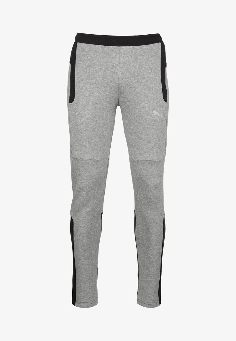 Grijze sweatpants met een zwarte elastische tailleband en zijzakken. Beschikt over een textuurstof en contrasterende zwarte zijpanelen.