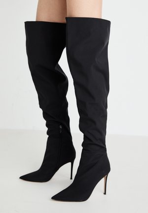 Black over-the-knee boots made of smooth material, pointed toe design, high stiletto heel, with a side zipper detail.
