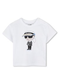 Witte katoenen t-shirt met korte mouwen, voorzien van een cartoonontwerp van een figuur in een zonnebril en een zweetband, en de tekst "KARL LAGERFELD".