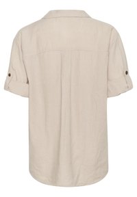 Beige linnen shirt met een zachte textuur, korte opgerolde mouwen, een klassieke kraag en een afgeronde zoom. De achterkant heeft een eenvoudige naaddetail.
