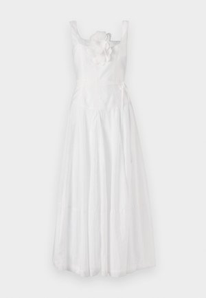 Vestito midi bianco con corpino aderente, spalline larghe e un accento floreale sulla sinistra. Gonna fluida con un leggero luccichio e un fiocco in vita.