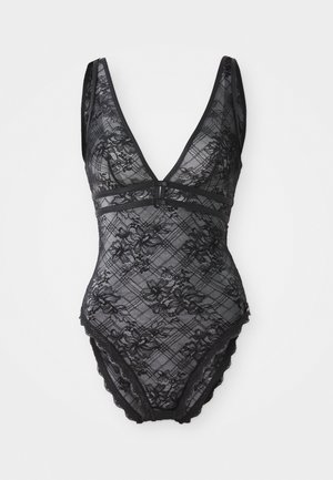 Melna mežģīņu bodijs ar ziedu rakstu, dziļu V veida kakla izgriezumu, plānām plecu siksnām un viļņotām malām.