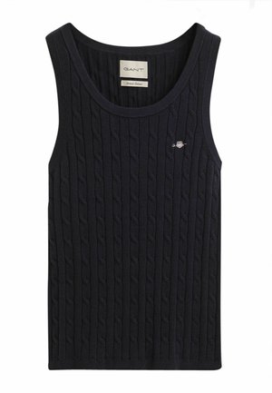 Námořnická modrá pletená tílko s kabelovým vzorem, kulatým výstřihem a malým logem na hrudi. Měkký materiál z bavlněné směsi.