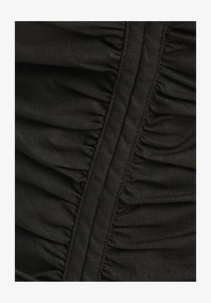 CALLI TYLER - Vabalt langev kleit - black