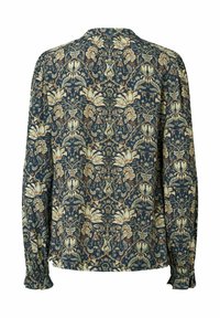 Blouse à manches longues en bleu foncé avec un motif floral et botanique complexe. Tissu doux avec des poignets froncés et un détail de bouton au dos.