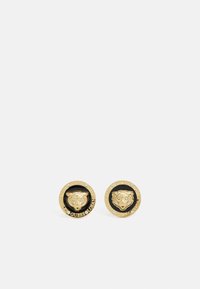 Gold-tone stud earrings featuring a raised tiger head design, surrounded by a contrasting black circle and embossed brand text.