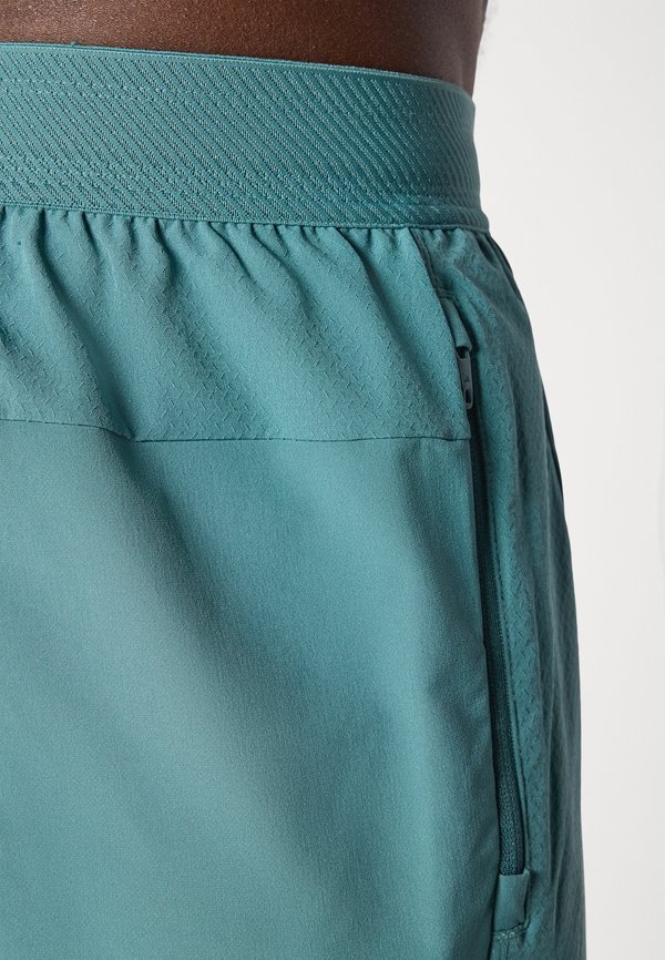 POWER SHORT - Sports shorts - preloved teal4