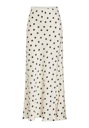 Lang nederdel i cremefarve med sorte polkaprikker og en let vidde forneden.