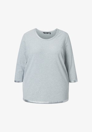 Lys grå langærmet skjorte med rund halsudskæring og subtil sølvkant ved ærmerne og kanten, præsenteret på hvid baggrund.