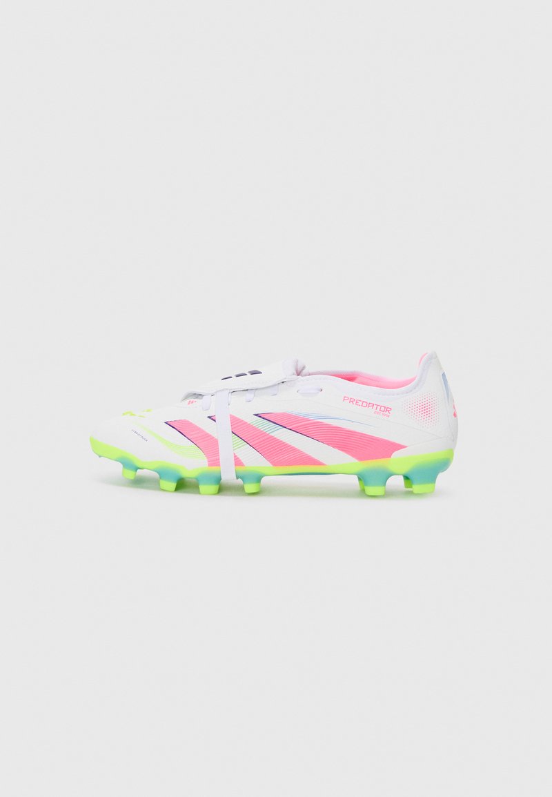 White soccer cleat with pink and green accents, featuring a textured upper, distinct stripe patterns, and conical studs on the sole.