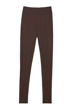 Brown leggings made of soft, stretchy fabric, featuring a high waistband and a form-fitting design. Smooth texture with no visible patterns.