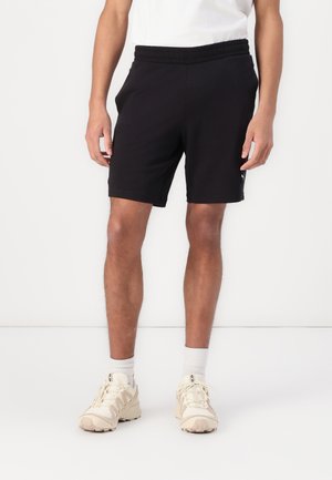 ESS ELEVATED - Tracksuit bottoms - black