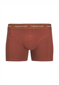 Bruine herenboxershort met een nauwsluitend ontwerp, zachte stof en een contrasterende tailleband met de tekst "Originals studio" in wit.