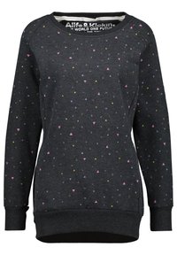 Sudadera negra con patrones triangulares coloridos en rosa, amarillo y púrpura. Cuenta con cuello redondo y puños y dobladillo acanalados. Textura de tela suave.