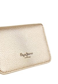 Gold textured wallet with a pebbled finish, featuring a logo embossed on the front, rectangular shape, and stitched edges.