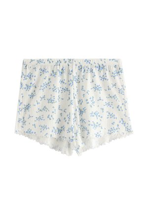 Blommiga sovshorts, tillverkade av lätt tyg, har en vit bakgrund med små blå blommor och delikat spetsdetalj vid fållen.