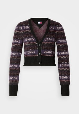 Cropped cardigan in dark shades with a patterned design featuring "TOMMY JEANS" in light text. V-neck, long sleeves, and button closure.