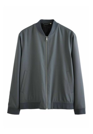 Veste bomber grise en tissu lisse, dotée d'une fermeture éclair, de poignets côtelés et de deux poches latérales. Design minimaliste avec une coupe classique.