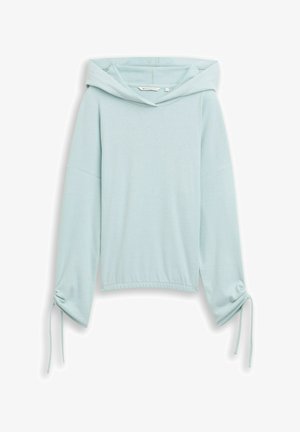 Hele helesinine kapuutsiga dress, millel on lõdva lõikega istuvus, pehme tekstuur ja tõmblukud varrukatel. Omab minimalistlikku disaini ja mustrid puuduvad.