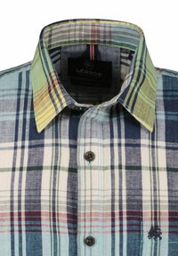 Checked button-up shirt in cotton. Features blue, green, yellow, and red plaid patterns, with a classic collar and brown buttons. Dark logo on the side.