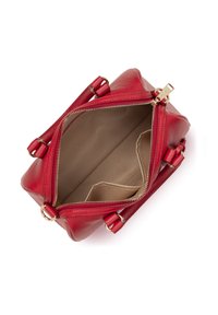 Red leather handbag with gold zipper open, showing beige interior lining and small inside pockets, on white background.