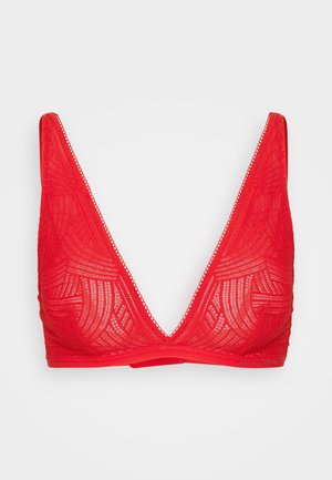Röd bralette med djup V-ringning, tillverkad av texturerad spets med geometriska mönster, avslutad med en smal kant runt kanterna.