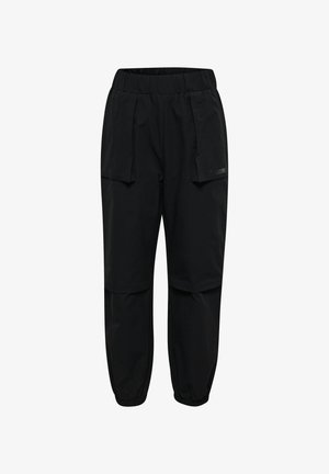 Czarne spodnie z elastycznym pasem, dużymi kieszeniami z klapami z przodu i elastycznymi mankietami, zaprojektowane do noszenia na co dzień lub do aktywności sportowych.
