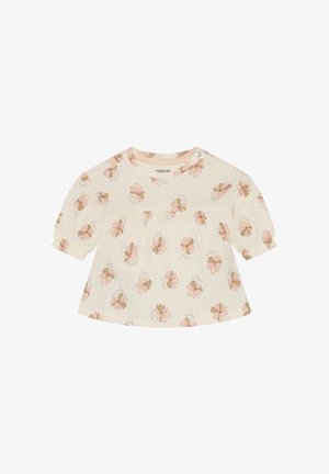 Witte katoenen blouse met pofmouwen, voorzien van een bloemmotief in roze en beige, gestructureerde stof en een knoopsluiting bij de halslijn.