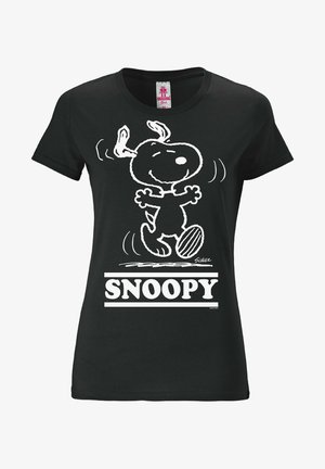 T-shirt en coton noir avec un graphique blanc de Snoopy dansant, avec le nom "SNOOPY" affiché en caractères gras en dessous. Texture lisse.