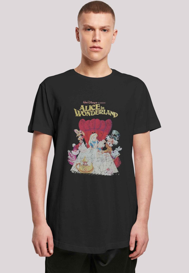 Black t-shirt featuring a vintage "Alice in Wonderland" graphic with colorful characters, highlighted by a distressed texture and bold lettering.