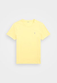 T-shirt in cotone giallo con maniche corte, scollo a girocollo e un piccolo logo ricamato sul lato sinistro del petto. Texture liscia e forma aderente.