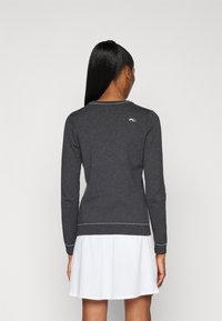 Kjus WOMEN KICKI V NECK  - Svetrík - black