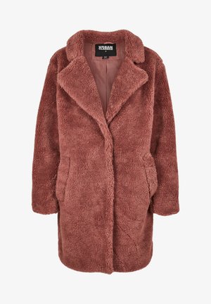 Faux pelskåpe i dempet rosefarge, med notched krage, to frontlommer og en myk, teksturert overflaten. Fôret innside.