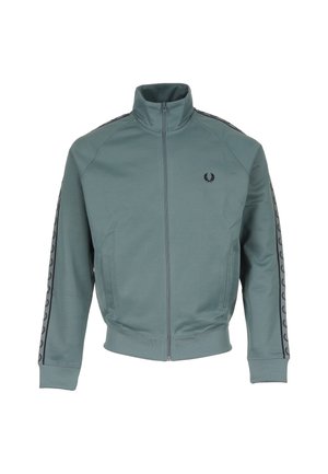 Teal zip-up track jacket with high collar, black laurel wreath logo on chest, and black logo stripe detailing along the sleeves.