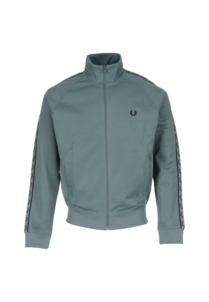 Chaqueta de chándal de color verde azulado con cremallera y cuello alto, logo de laurel negro en el pecho y detalles de rayas de logo negro a lo largo de las mangas.